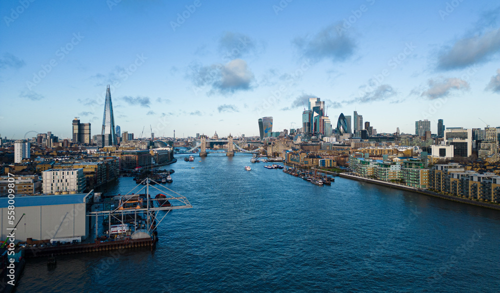 Aerial view over Tower Bridge and the city of London - LONDON, UNITED KINGDOM - DECEMBER 20, 2022