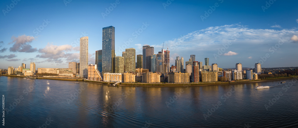 The skyscrapers of Canary Wharf in London on Isle of Dogs - panoramic view - LONDON, UNITED KINGDOM - DECEMBER 20, 2022