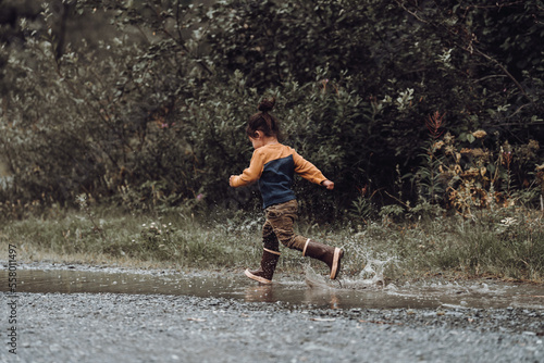 Toddler playing in water