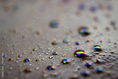 Close-up of bubbles on the surface of a cup of coffee  with a blurry background