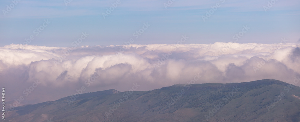 Beautiful mist over the mountains. Khyzy region. Azerbaijan.
