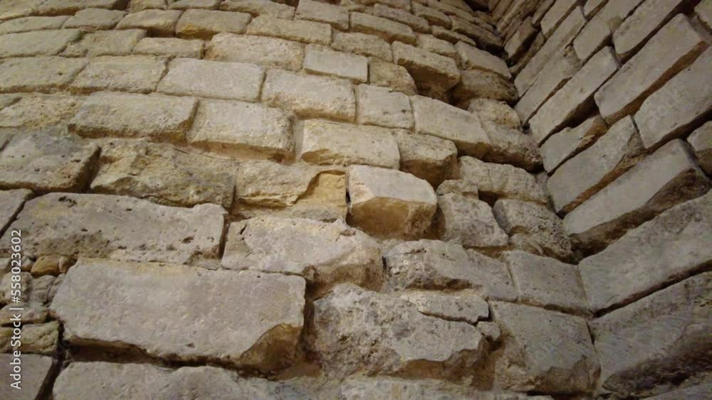 Weathered Ancient Bricks And Stone Wall Interior Of A Medieval Tower. closeup, tilt-up