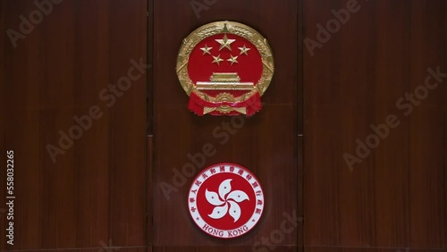 People's Republic of China, top, and Hong Kong Special Administrative Region (HKSAR), below, emblems are seen at the main chamber at the Legislative Council building (Legco) in Hong Kong. photo