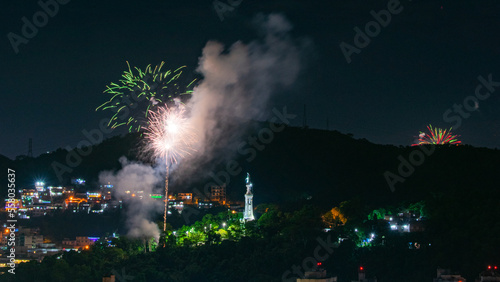 NITERÓI, RIO DE JANEIRO, BRAZIL – 01/01/2023: Night photo of the arrival of the New Year (Réveillon) with fireworks in the sky of a Brazilian city