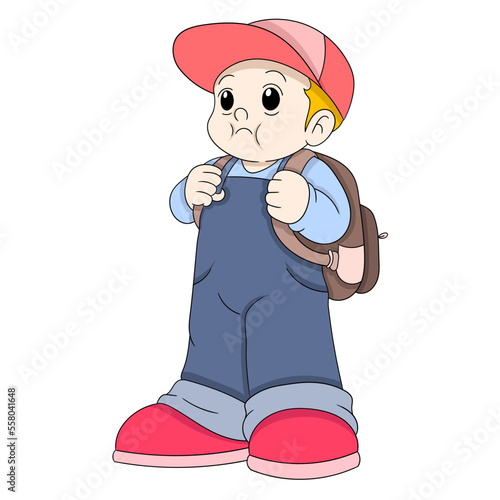 schoolboy wearing cool clothes carrying bag ready to school