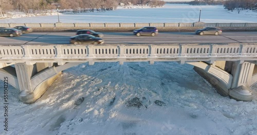 Reverse From Traffic On Ferry Street Bridge In Winter Champlin Minnesota - Drone photo