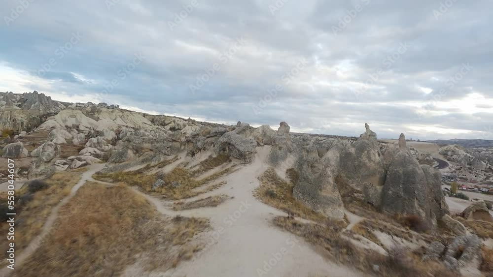 Flying Over Wild Campground With Carved Stone Homes In Cappadocia, Turkey. - Drone Shot Flying Over Wild Campground With Carved Stone Homes In Cappadocia, Turkey. - Drone Shot