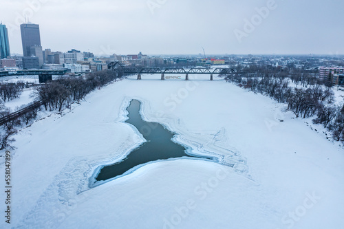 Unfrozen opening in the red river in Winnipeg, Manitoba.