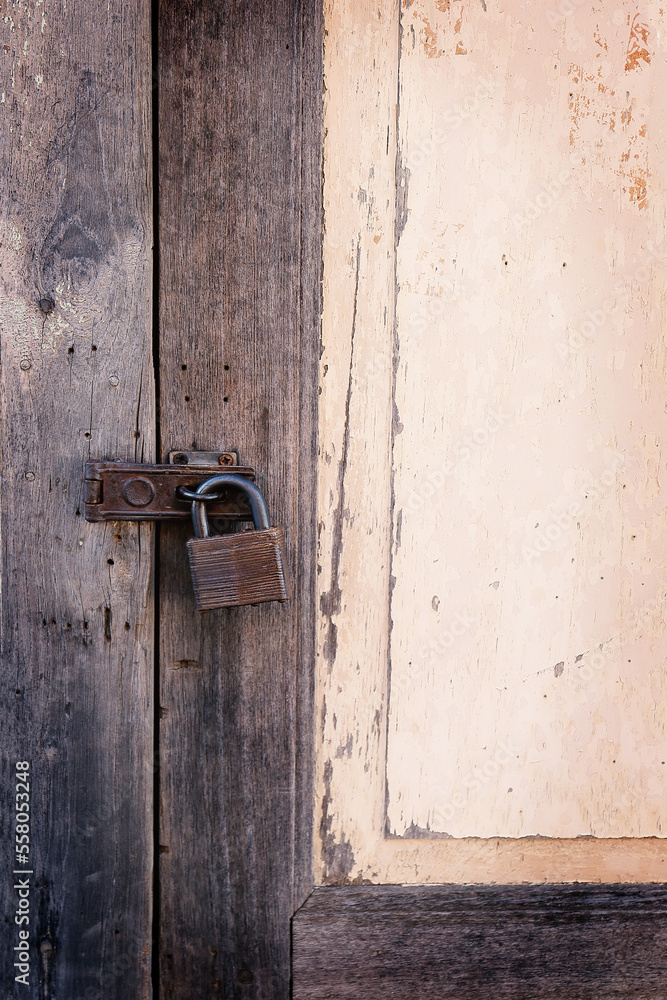 Lock the door of the old house, real village style Lock the door of the old house, real village style