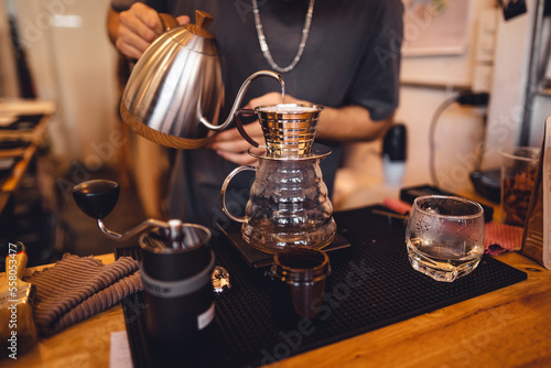 Close up of hand brewing coffee