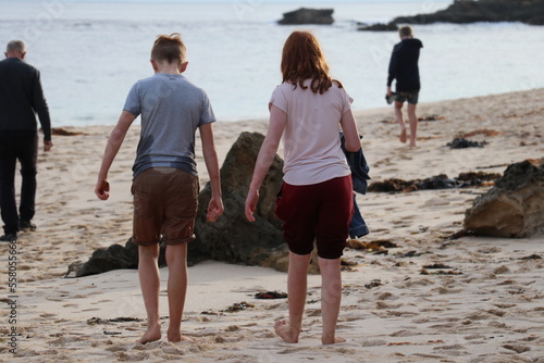 children playing on the beach