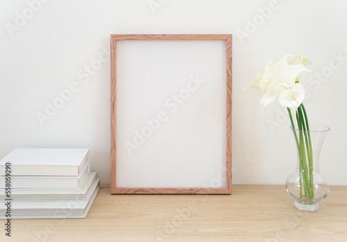 Wood Frame Mockup Blank Empty Flower Vase Books Desk Top View © KimKim