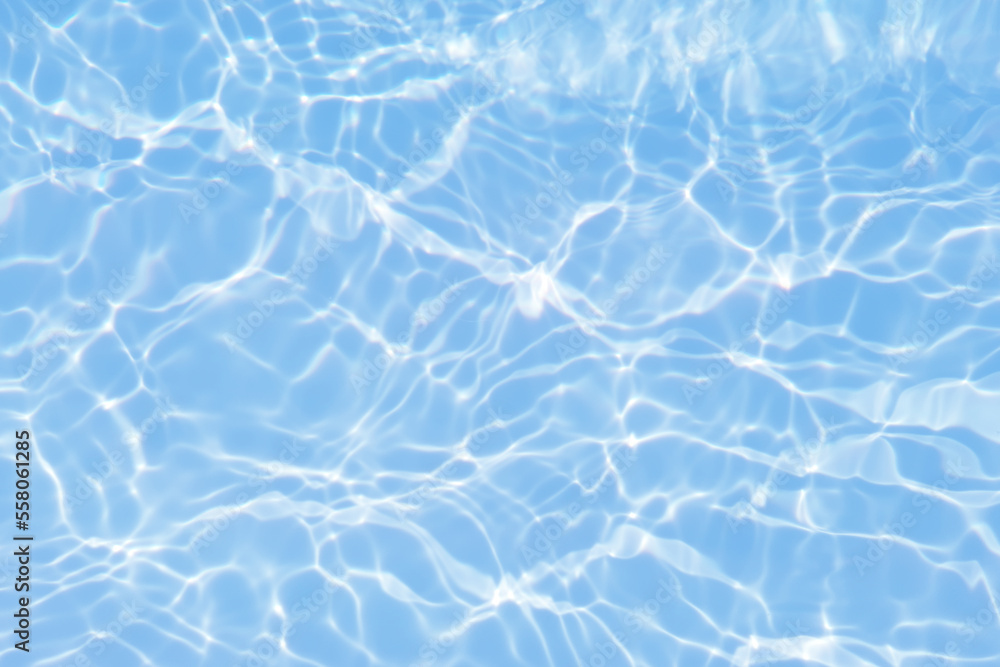 Defocus blurred transparent blue colored clear calm water surface texture with splashes and bubbles. Trendy abstract nature background. Water waves in sunlight with copy space. Blue watercolor shining Defocus blurred transparent blue colored clear calm water surface texture with splashes and bubbles. Trendy abstract nature background. Water waves in sunlight with copy space. Blue watercolor shining