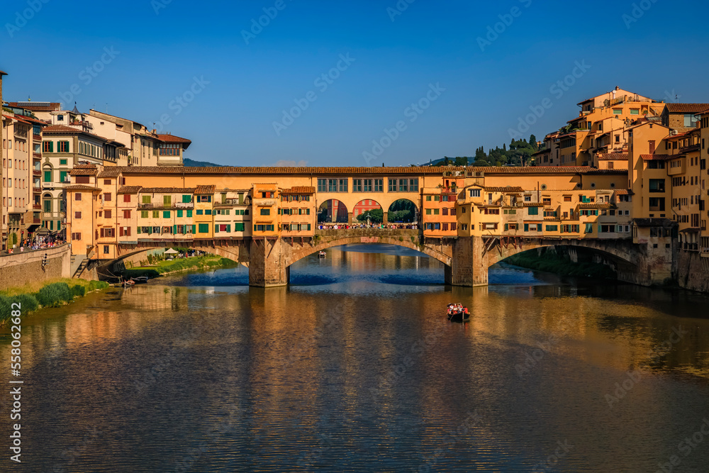 Close up of silversmith shops on the famous Ponte Vecchio bridge on the Arno River in Centro Storico, Florence, Italy