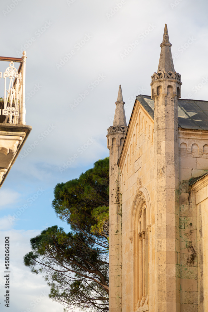 Obraz premium Old catholic chapel and balcony. Tourism, old town