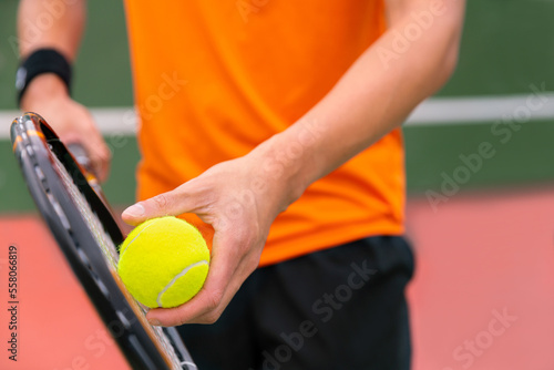 tennis player play tennis sport by hit tennis ball with tennis racket in tennis court and stadium for tennis challenge tournament for health and exercise © kunchainub