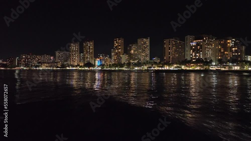 Wallpaper Mural 30fps nighttime drone footage of waikiki hawaii flying into strip with skyline and traffic in honolulu with waves and city lights and palm trees Torontodigital.ca