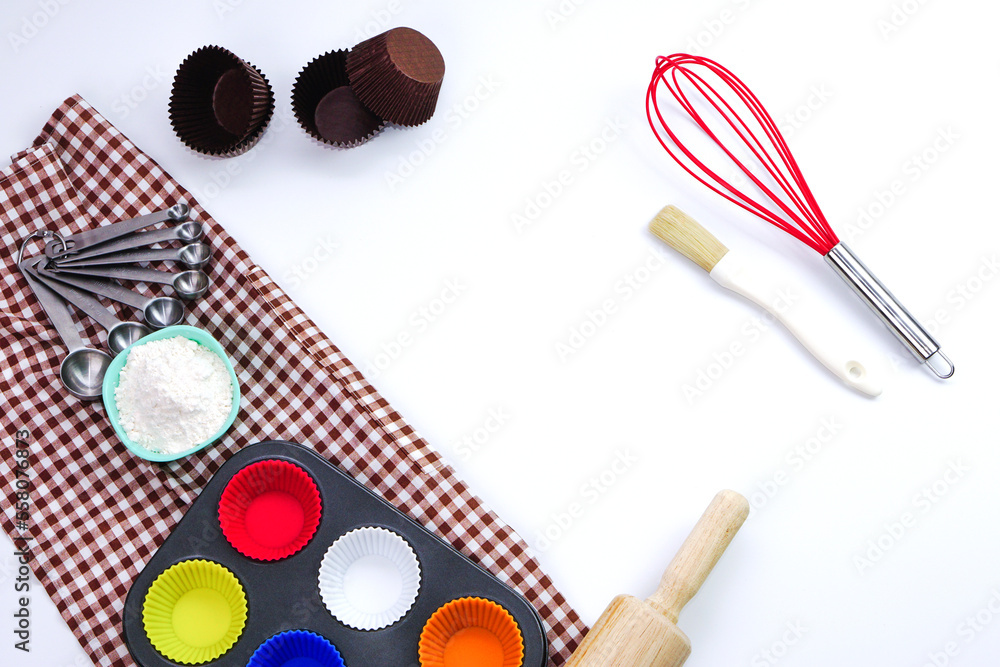 Top view set of kitchen utensils and ingredients for bakery on white background. Materials or kitchen equipment for bakery. Top view set of kitchen utensils and ingredients for bakery on white background. Materials or kitchen equipment for bakery.