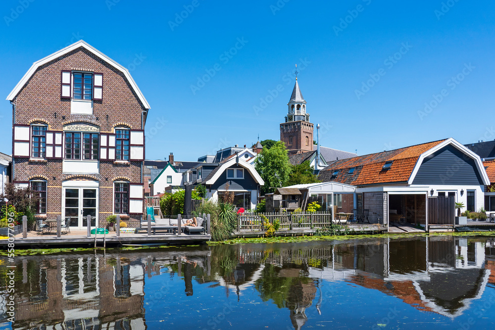 View of some beautiful old buildings along the Oude Rijn in Bodegraven, the Netherlands View of some beautiful old buildings along the Oude Rijn in Bodegraven, the Netherlands