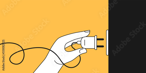 A person holds a cord from a household appliance in his hand. Image of the hand that turns the plug into the power grid.