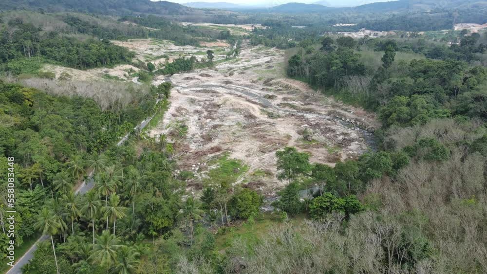 Aerial view of horrible deforestation for wood, logging, environmental destruction on mountain. Ecology concept change tree forest drought and forest refreshing, flying forward over a felled forest Aerial view of horrible deforestation for wood, logging, environmental destruction on mountain. Ecology concept change tree forest drought and forest refreshing, flying forward over a felled forest