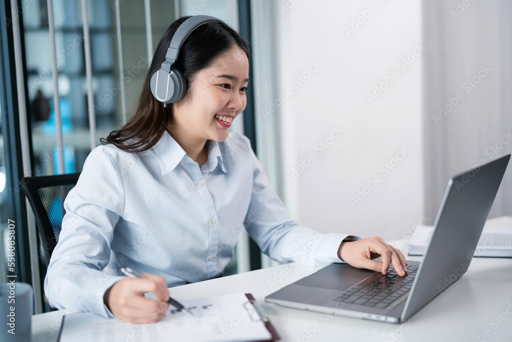 Asian Businesswoman VDO Call Conference Work talk chat online video call on laptop webcam conference working with laptop online briefing E learning and social distancing concept. Asian Businesswoman VDO Call Conference Work talk chat online video call on laptop webcam conference working with laptop online briefing E learning and social distancing concept.