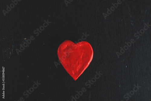 Love hearts on wooden texture background. Valentine’s day card concept. Heart for Valentine’s Day Background.