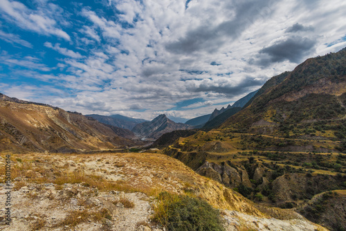 Changeable weather in the Caucasus Mountains. Panoramic view.