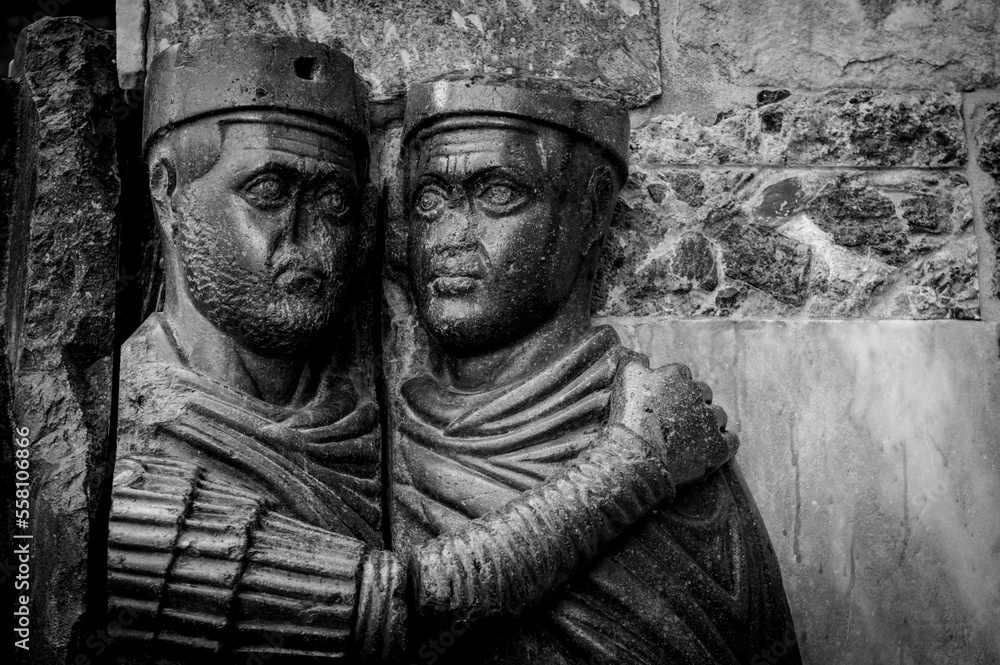 Fototapeta premium Sightseeing in Italy, Venezia, square San Marco, pillars and pictures with statues in historical cathedral, 