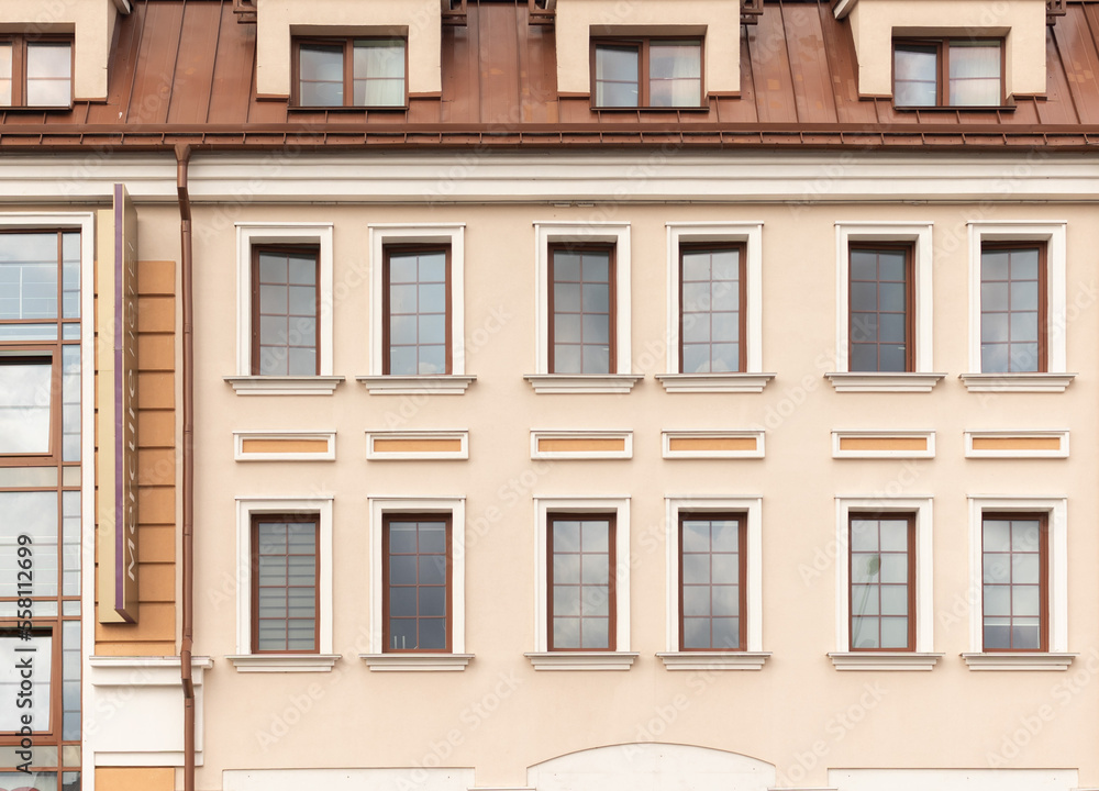 Background for design of a window texture on a wall of modern buildings business centers Background for design of a window texture on a wall of modern buildings business centers