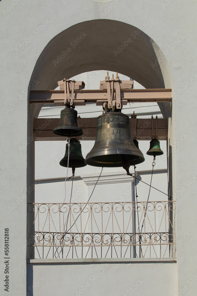 Obraz premium Big bells on a white wall