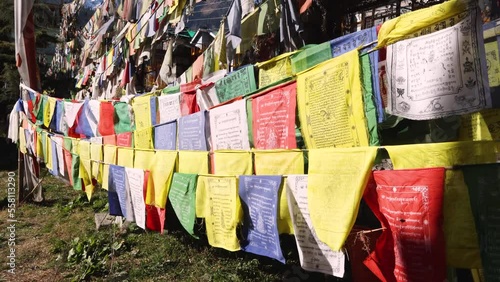 Tibetan monastery in Kullu Manali Himachal Pradesh India. Buddhist prayer flags fluttering in Buddha temple Himalayas. photo
