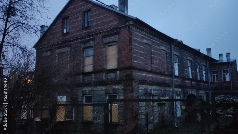 Old abandoned house in the evening at dusk. Old abandoned kamenica in Poland Old abandoned house in the evening at dusk. Old abandoned kamenica in Poland