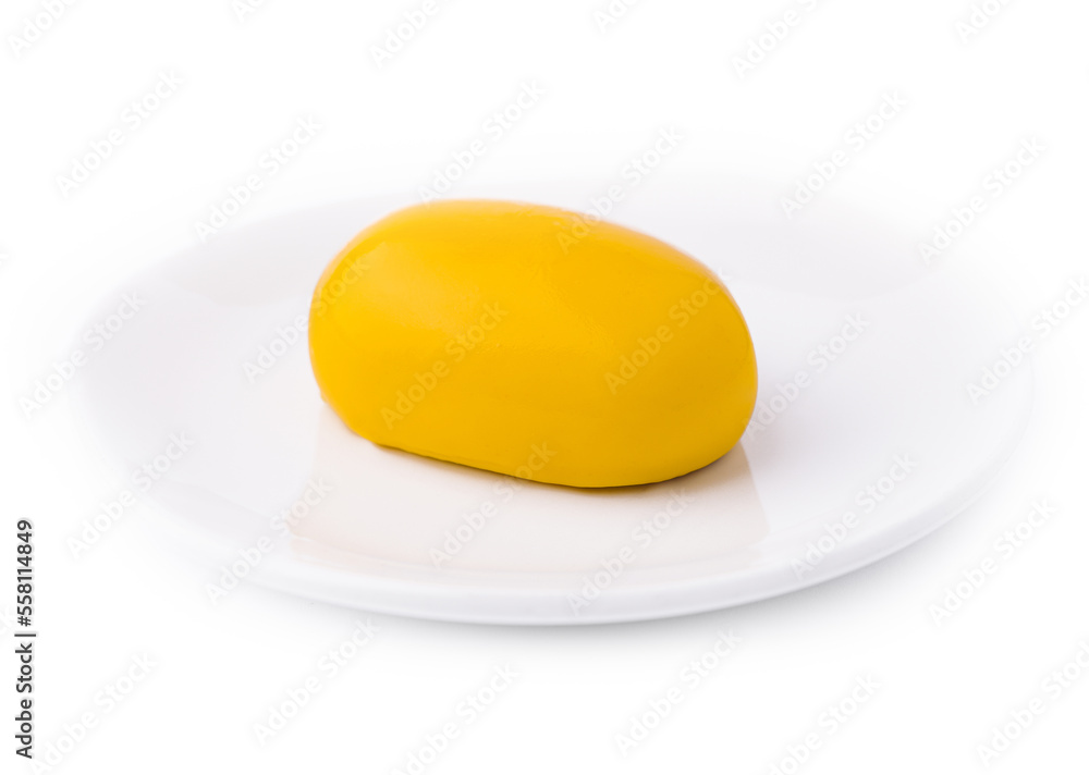 Yellow French mousse-cake on plate Yellow French mousse-cake on plate