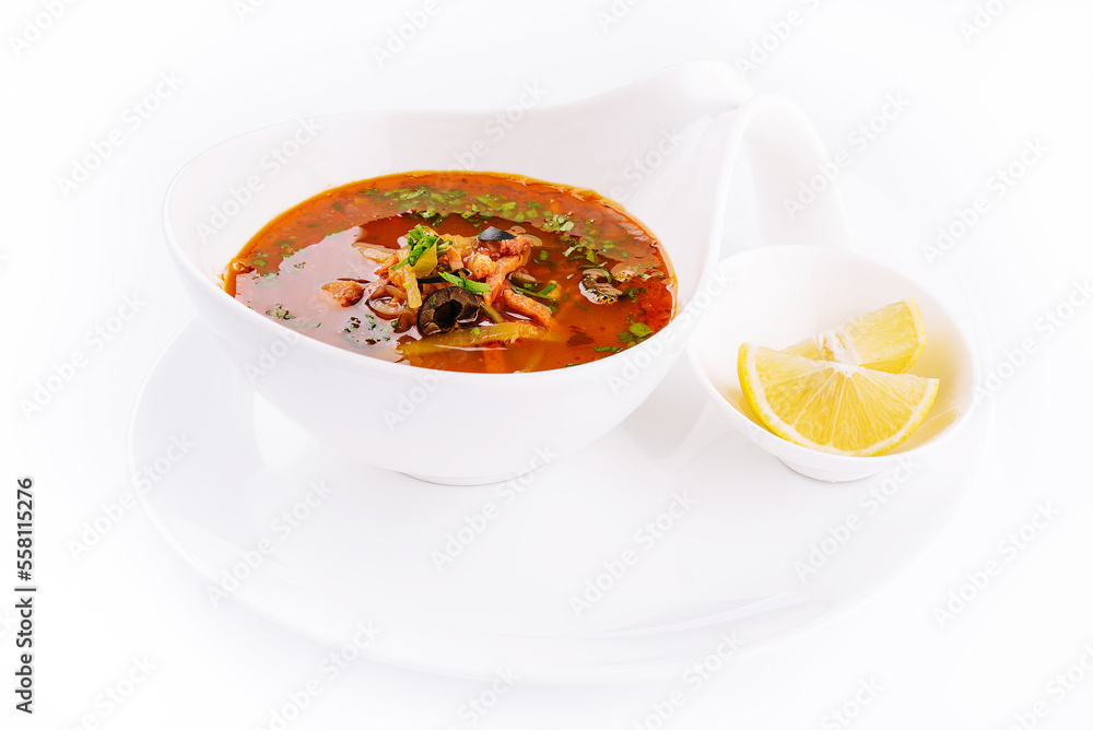 meat soup Solyanka in bowl isolated on white background meat soup Solyanka in bowl isolated on white background