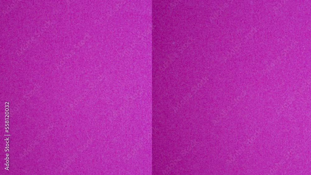 Purple paper on chroma key background. Paper slide animation on green screen background with copy space. Purple paper on chroma key background. Paper slide animation on green screen background with copy space.