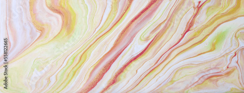 Abstract fluid art background beige and golden colors. Liquid marble.