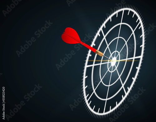 Red dart focus targeting to center of neon light dartboard in the dark scene. Business target, investment goal, marketing challenge, idea strategy, purpose achievement concept
