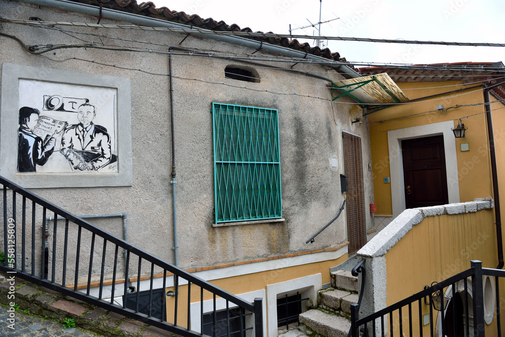 houses in the historic center mural is dedicated to the policeman Joe Petrosino an Italian naturalized US policeman a pioneer in the fight against organized crime Padula Italy