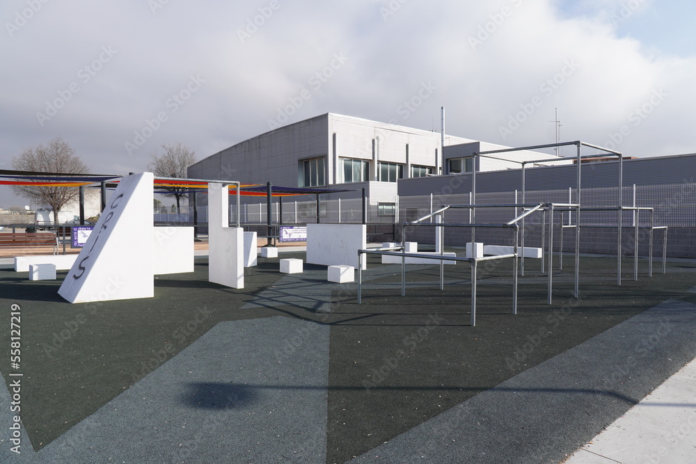 Horizontal image of a playground for parkour with protective rubber flooring, wall areas and metal railings. Horizontal image of a playground for parkour with protective rubber flooring, wall areas and metal railings.