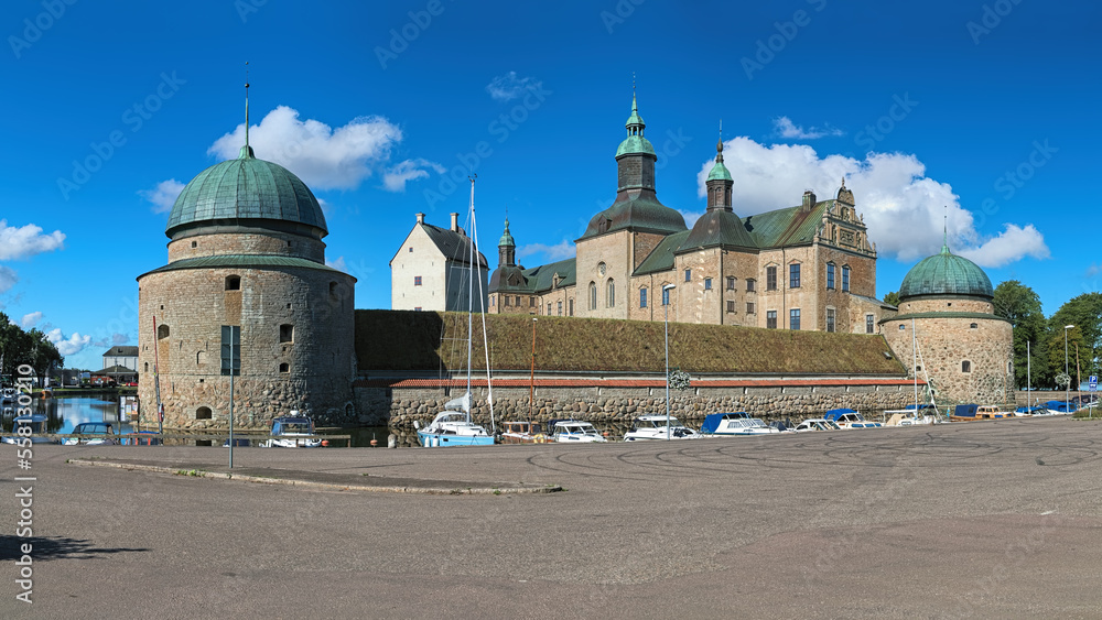 Vadstena Castle and guest harbor in the castle's moat, Sweden. View from east. Construction of the castle was started in 1545. It was completed in 1620.