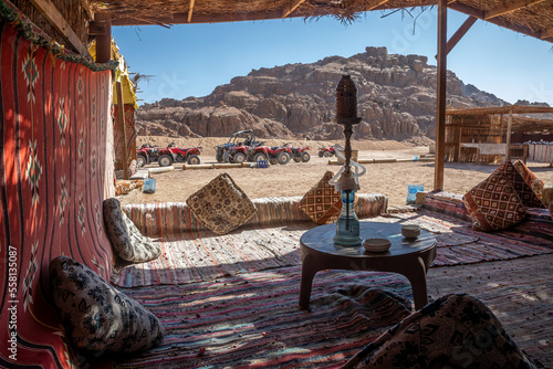 Valokuva A hookah stands on a table in a Bedouin town