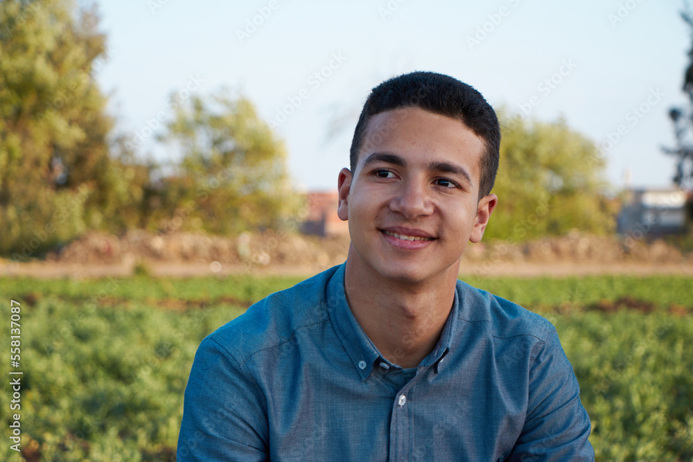 close up portrait of a young man with a field close up portrait of a young man with a field