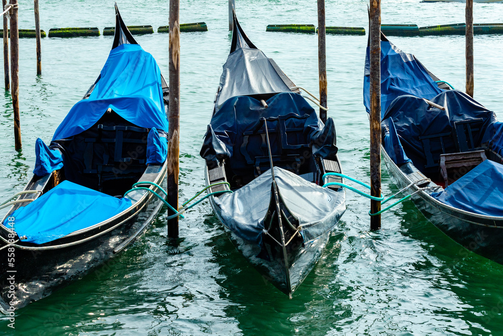 Gondolas in Venice, Italy. Water parking for boats.