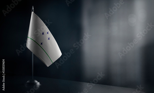 Small national flag of the Mercosur on a black background photo