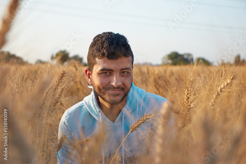 close up portrait of a young man with a field  © Mostafa Eissa