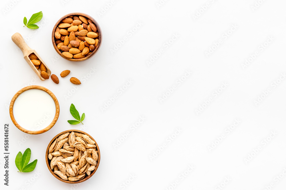 Organic almond milk with almond nuts. Non dairy vegan drink Organic almond milk with almond nuts. Non dairy vegan drink