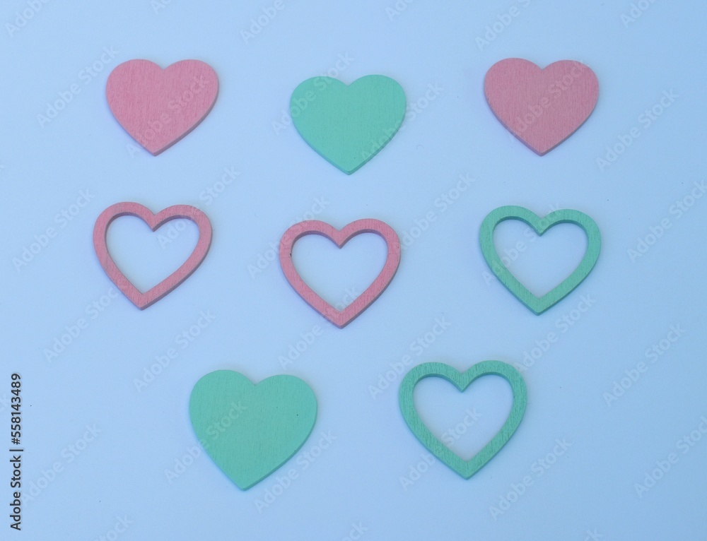 Valentines Day colorful paper hearts border over white
