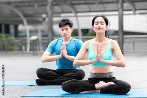 healthy man and woman yoga exercise for relax health yoga class sport exercise together with happy moment and balance fit bidy on yoga mat fitness