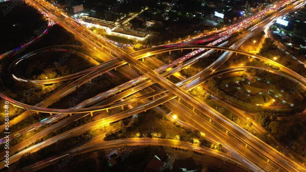 Traffic an important infrastructure, financial technology, Expressway top view, traffic transportation above intersection road in city night sky aerial view cityscape of advanced innovation,Hyperlapse Traffic an important infrastructure, financial technology, Expressway top view, traffic transportation above intersection road in city night sky aerial view cityscape of advanced innovation,Hyperlapse